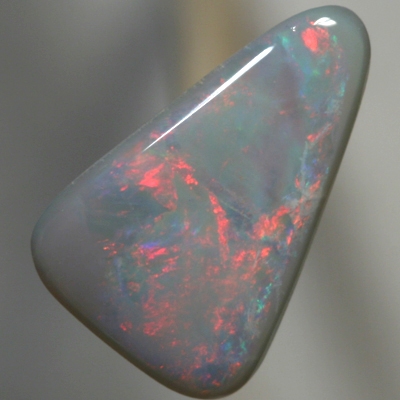 SOLID SEMI BLACK OPAL Rolling flashes of red and blue